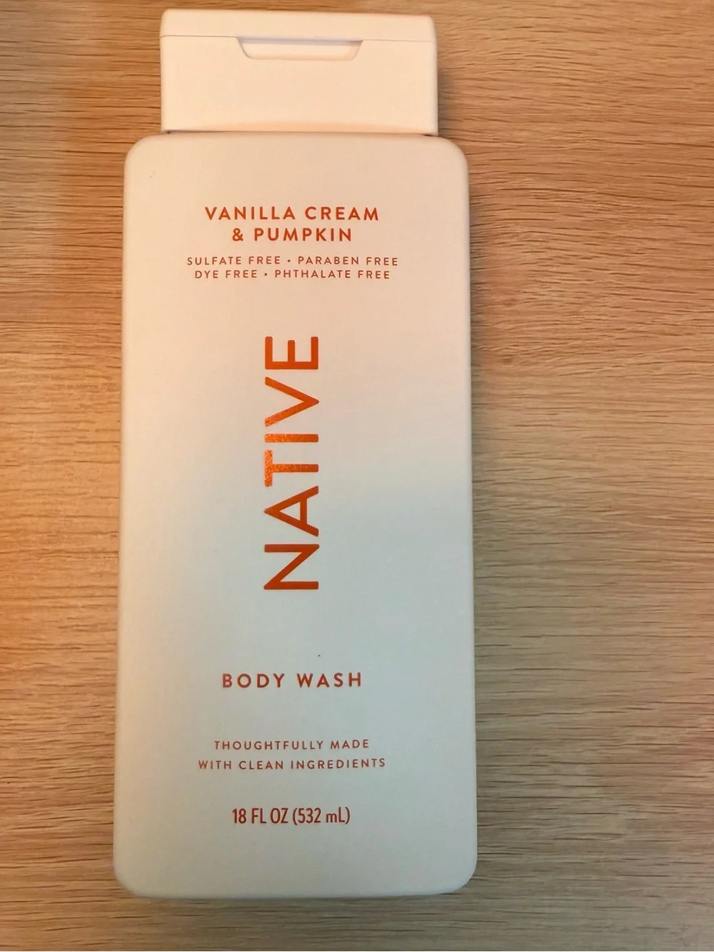 Native Vanilla Cream & Pumpkin Body Wash — White with Orange Text